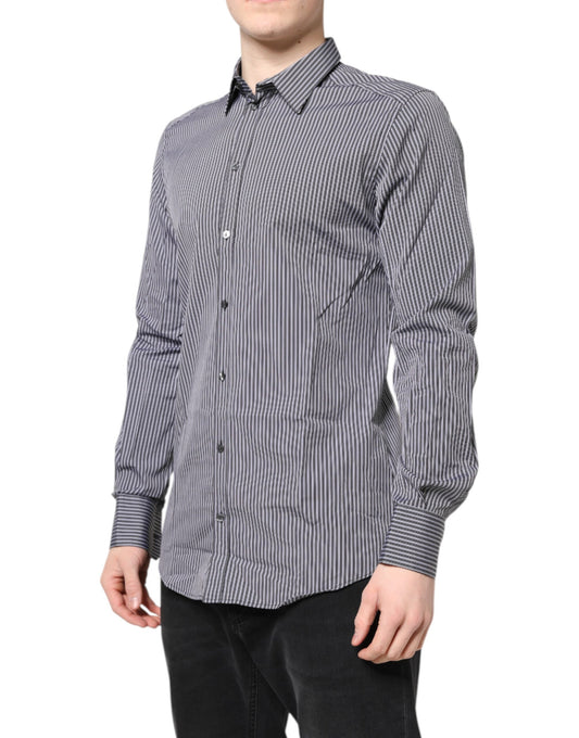 A black and white striped dress shirt with gold accents, designed by Dolce & Gabbana