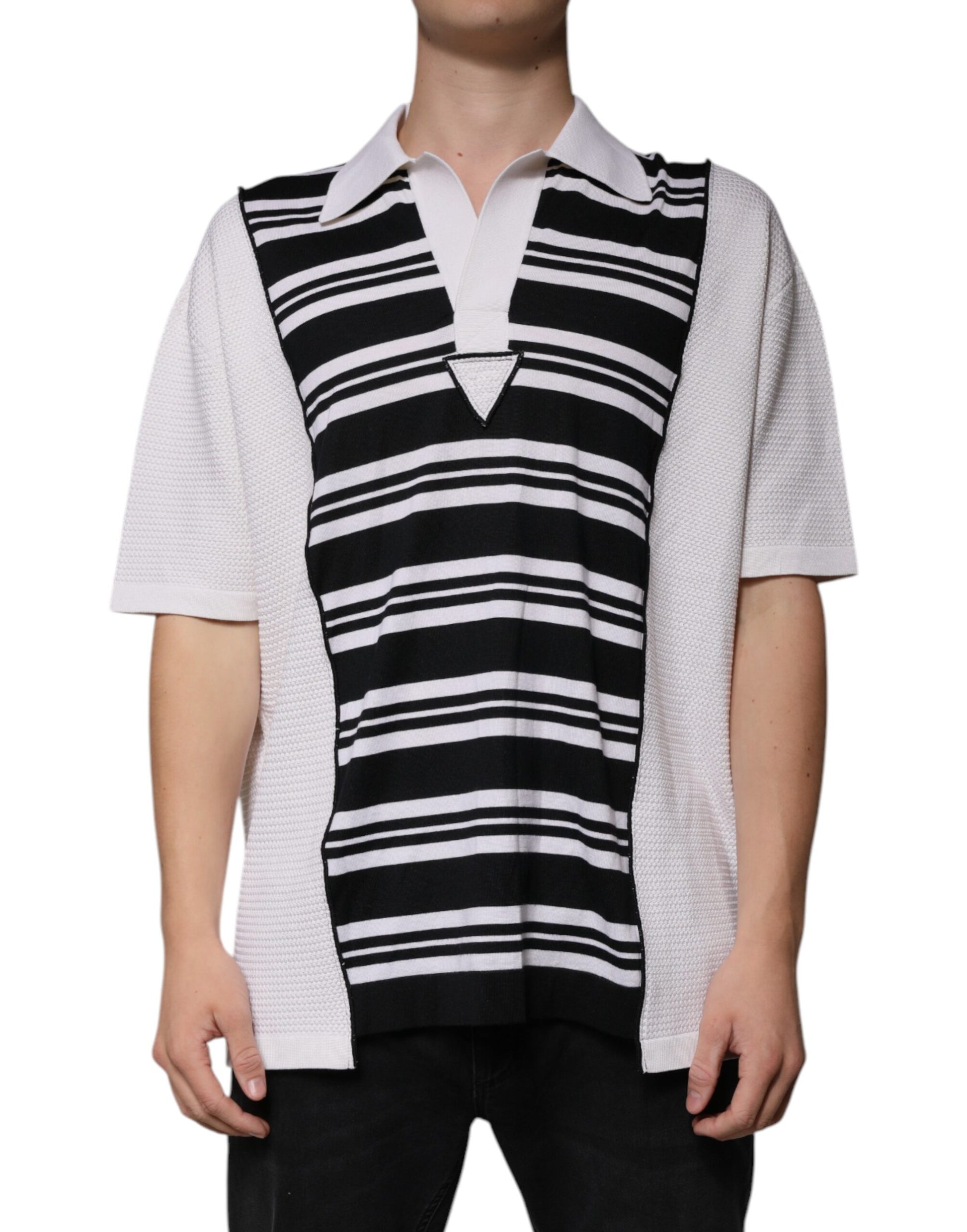 Black and white striped vest over a short sleeve shirt