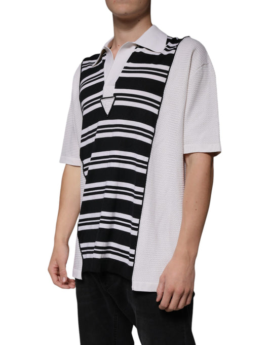Man wearing a black and white striped vest over a short sleeve shirt