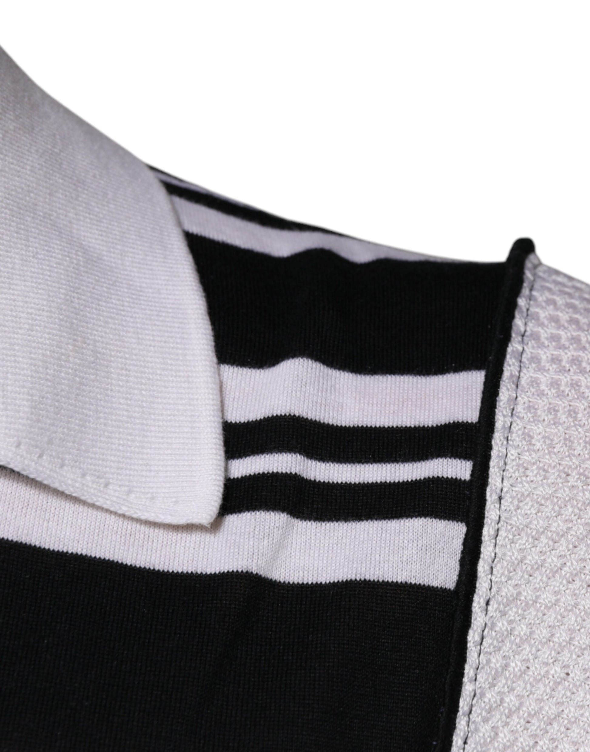 Black and white striped polo shirt