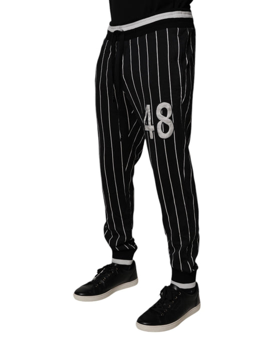 Black and white striped pants with number 48 on leg
