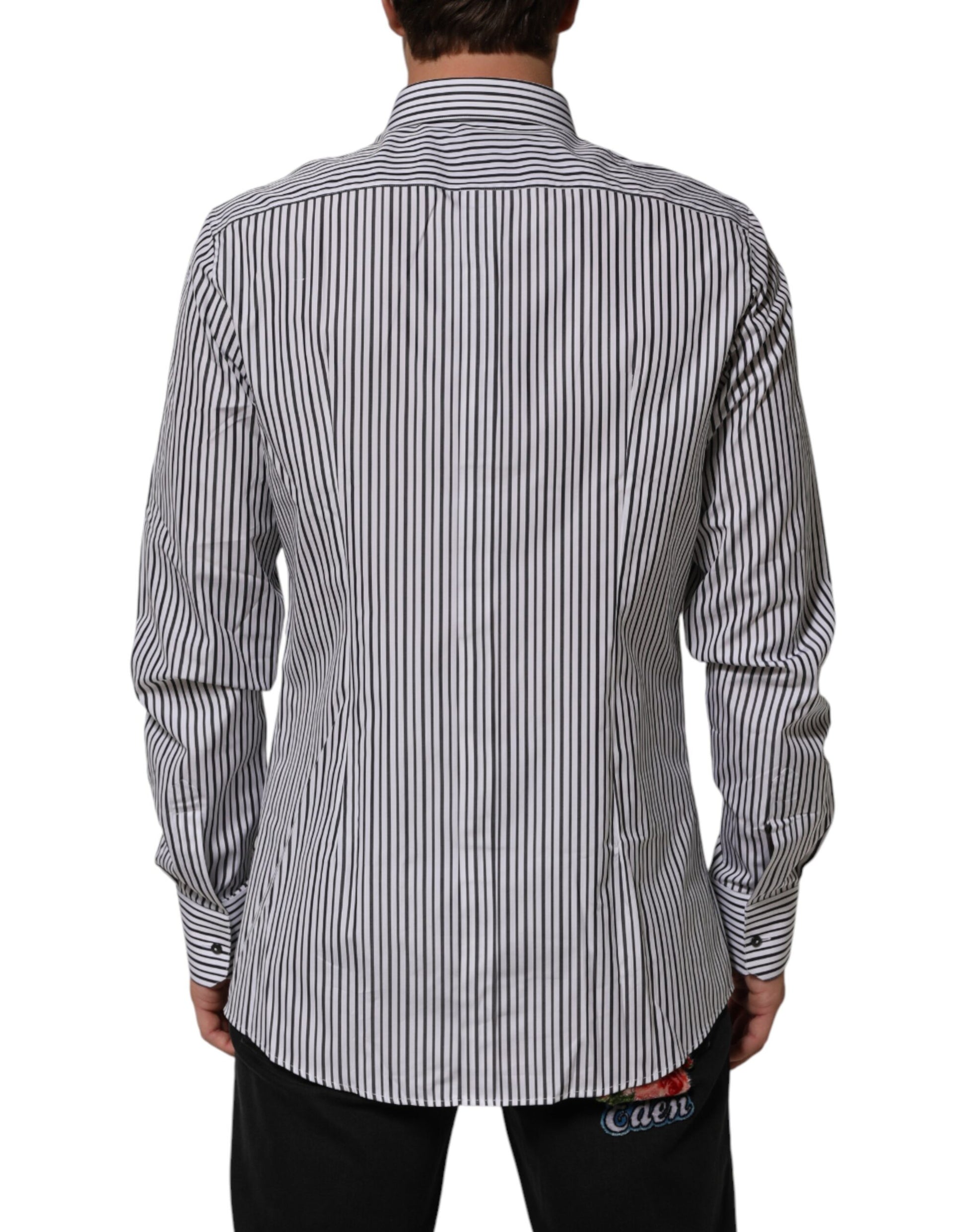 A black and white striped men's dress shirt with a collar, long sleeves, and a button-up front