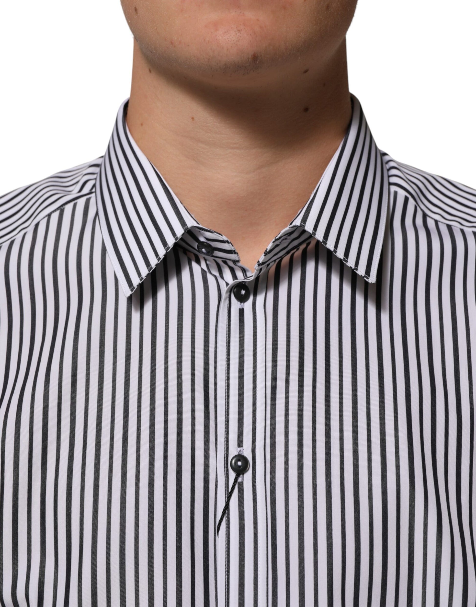 A black and white striped men's dress shirt with a gold collar