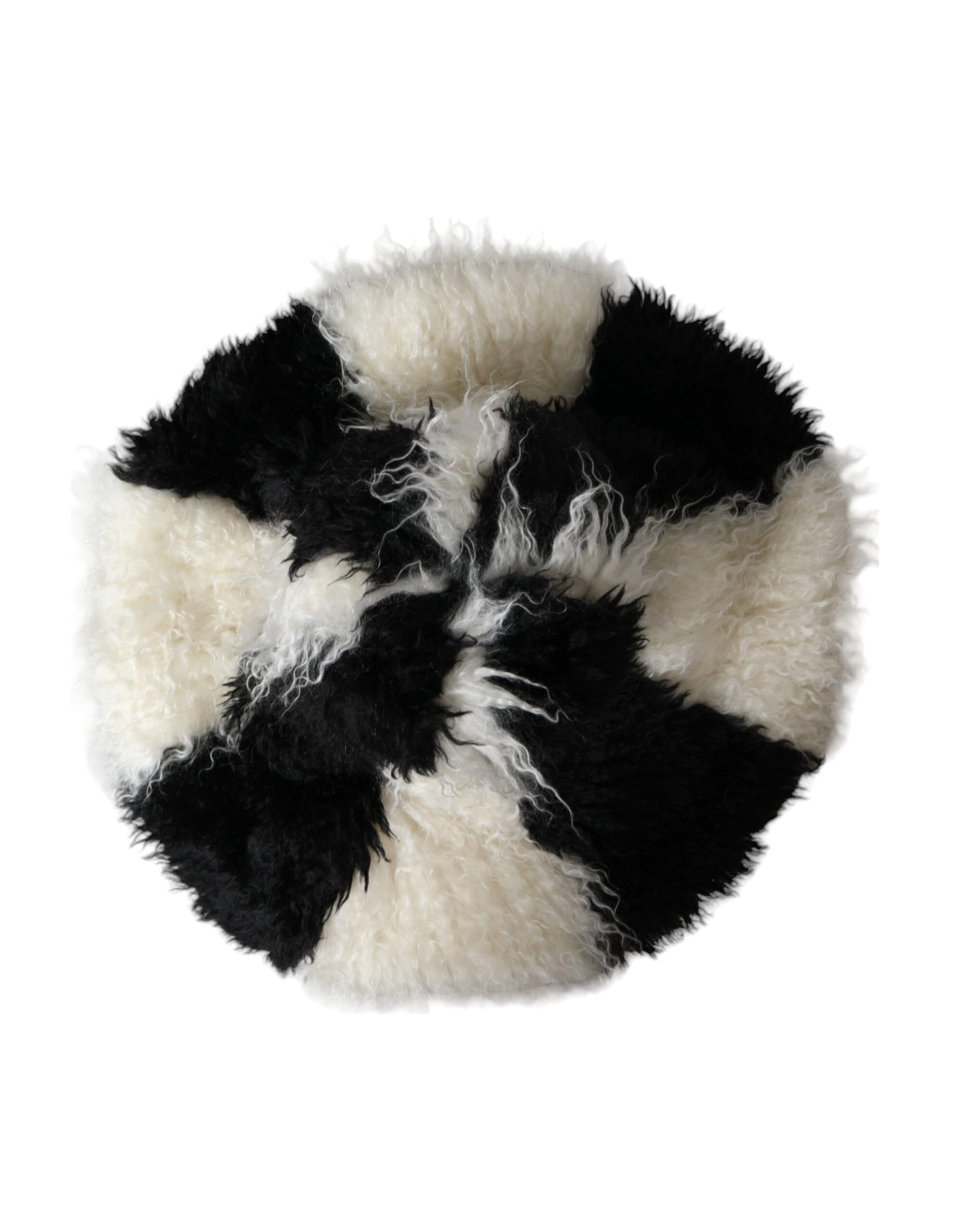 Fuzzy circular throw pillow with black and white pattern