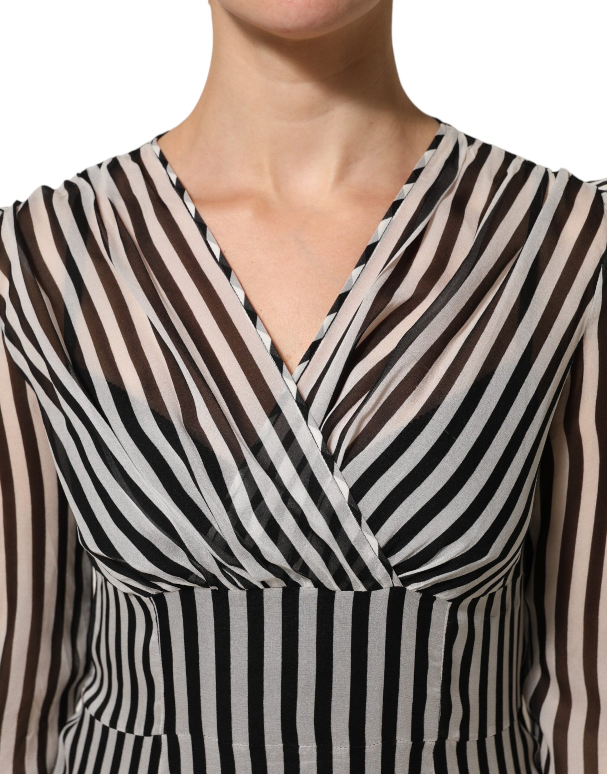 A black and white striped silk midi dress with a V-neck