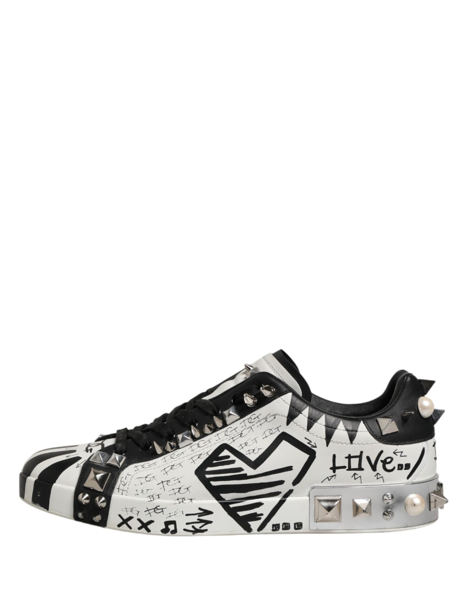 Black and white sneaker with spikes on sides