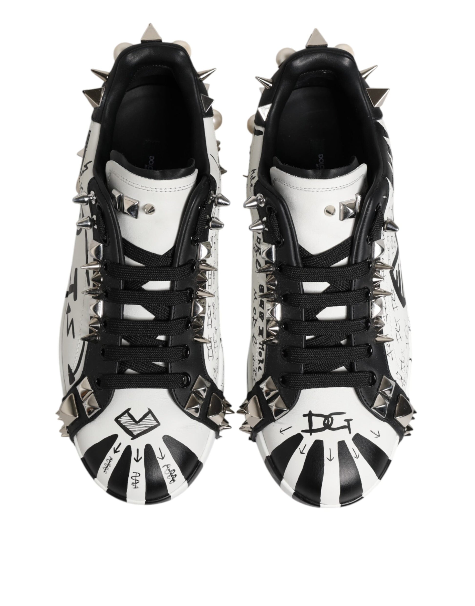 Pair of black and white studded low top sneakers with D&G logo