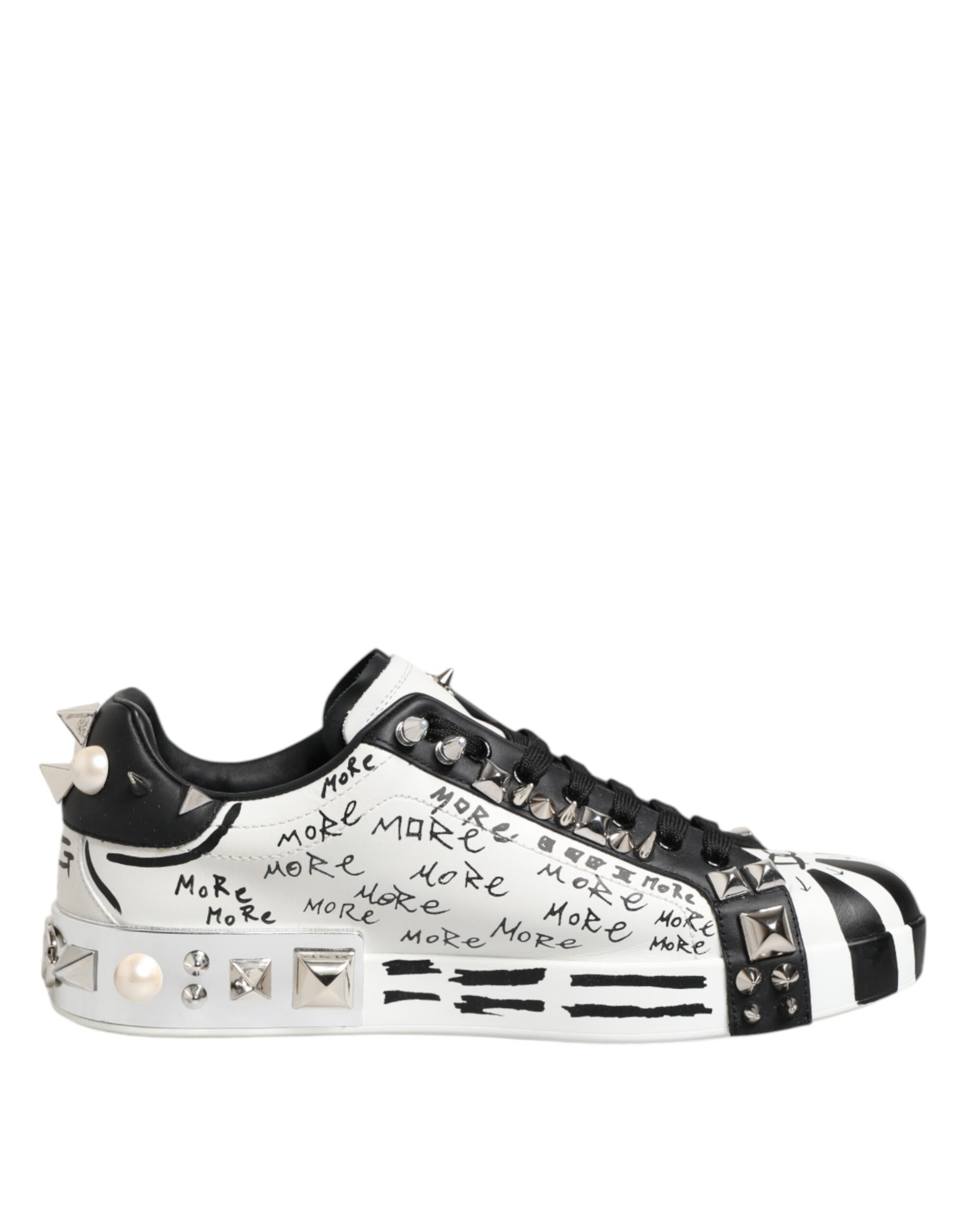A pair of black and white studded low top sneakers from Dolce & Gabbana