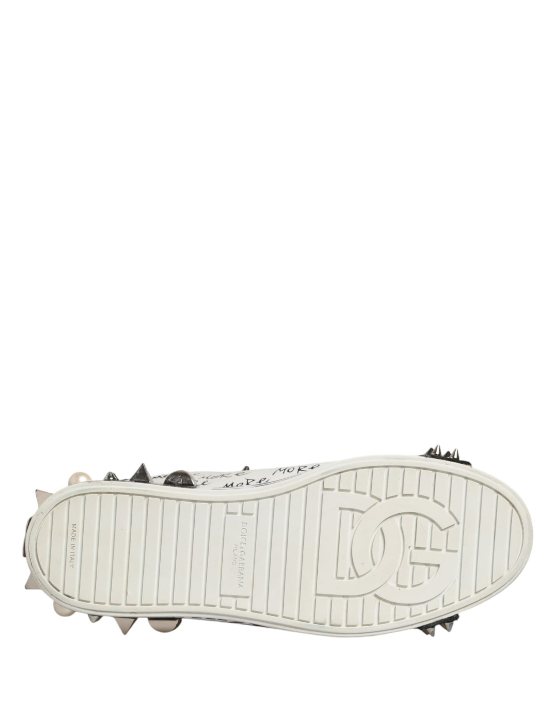White shoe with cleats on bottom