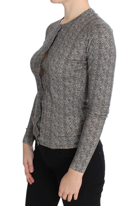 Woman wearing a black and white patterned top