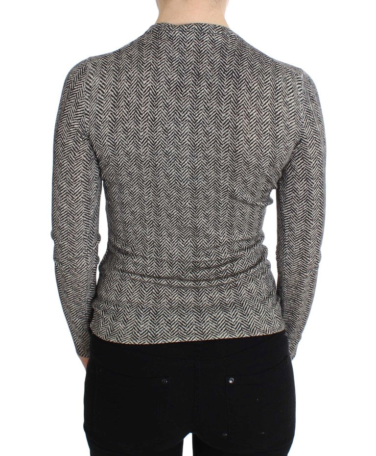 Back of a person wearing a knitted sweater