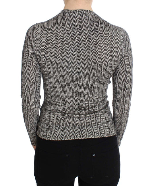 Back of a person wearing a knitted sweater