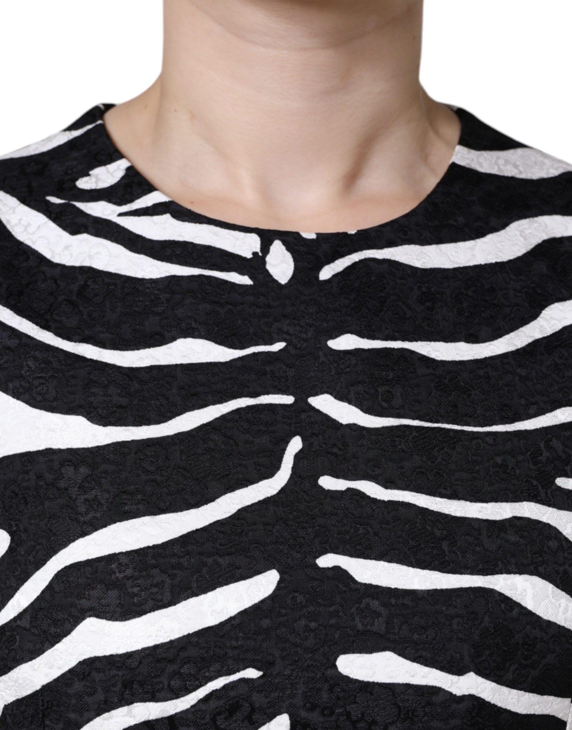 A black and white zebra print dress with an A-line silhouette