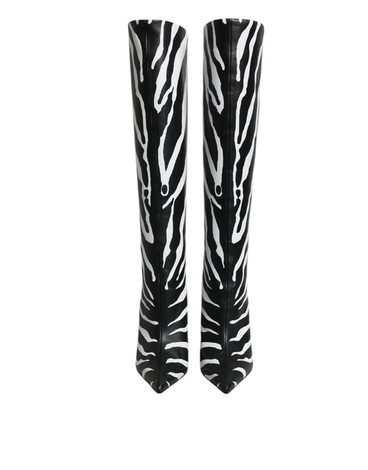 Pair of zebra print knee high boots