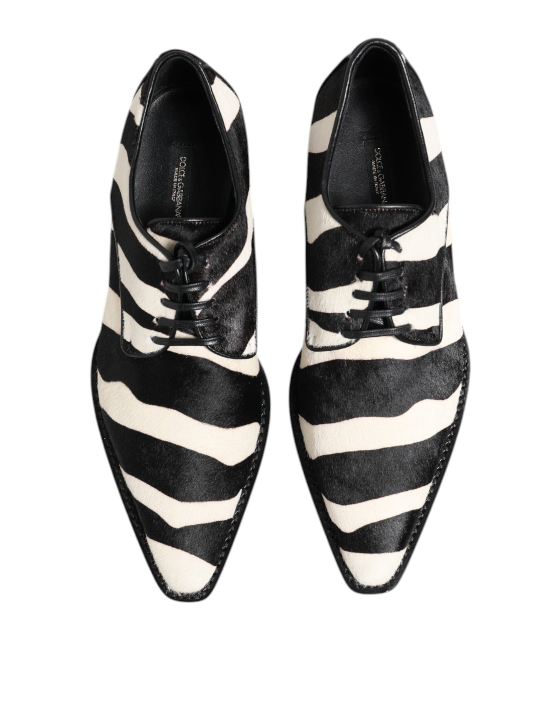 A pair of black and white zebra print dress shoes by Dolce & Gabbana