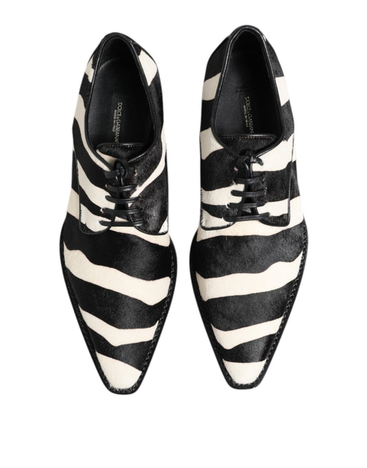 A pair of black and white zebra print dress shoes by Dolce & Gabbana