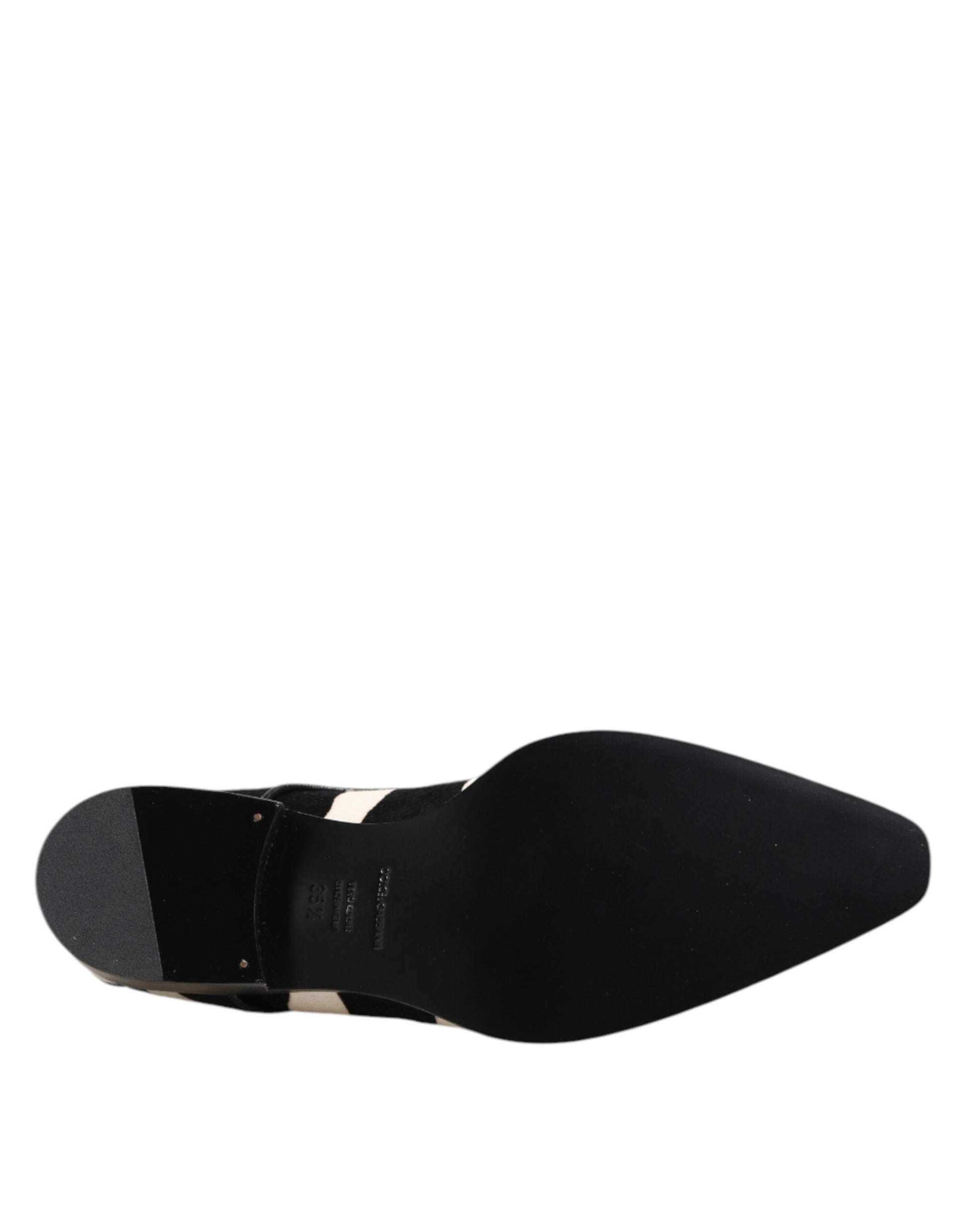 A pair of black and white zebra print dress shoes by Dolce & Gabbana