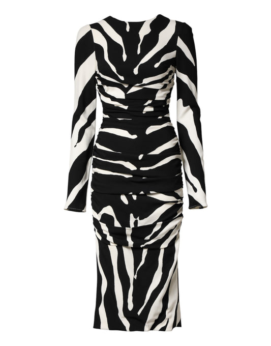 A black and white zebra print midi dress with a sheath silhouette