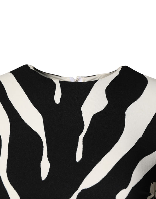 A black and white zebra print midi dress with a viscose fabric