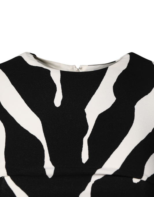 A black and white zebra print midi dress made of viscose