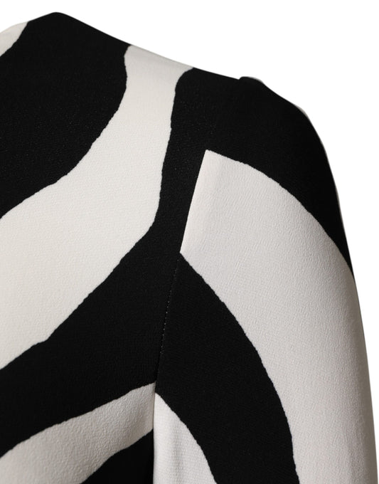 A black and white zebra print midi dress with viscose fabric