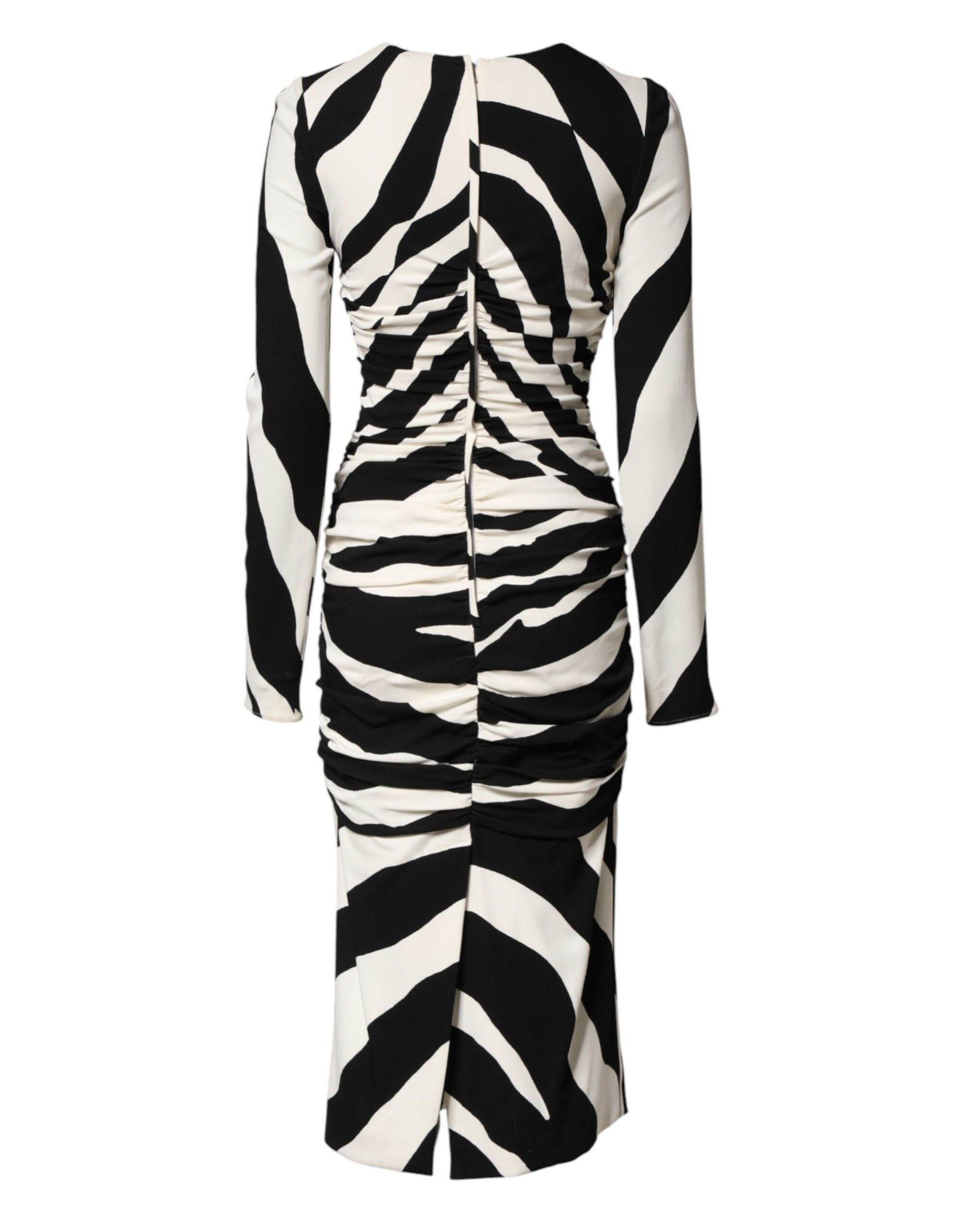 A black and white zebra print midi dress with a fitted bodice and flared skirt