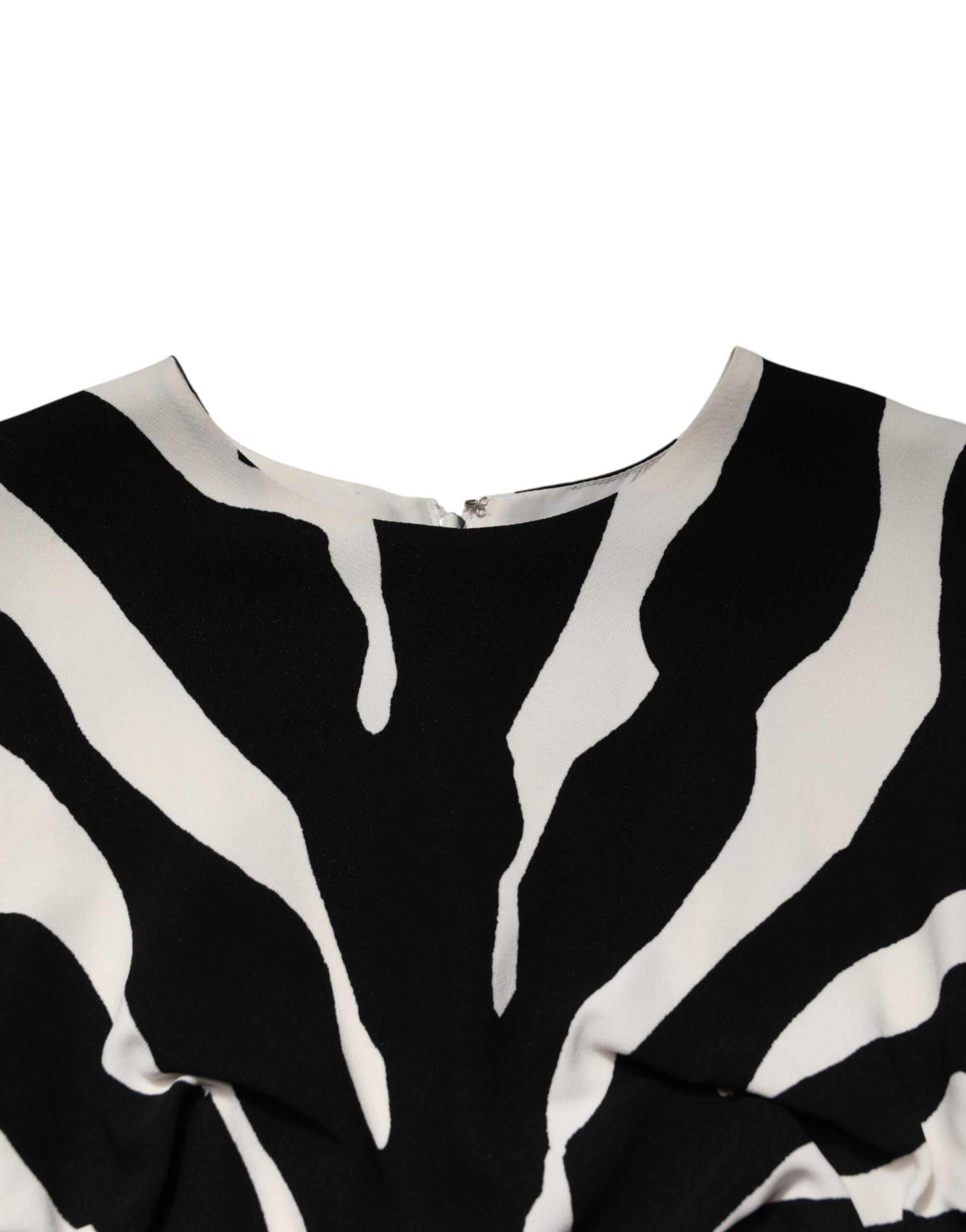 A black and white zebra print midi dress with a viscose fabric