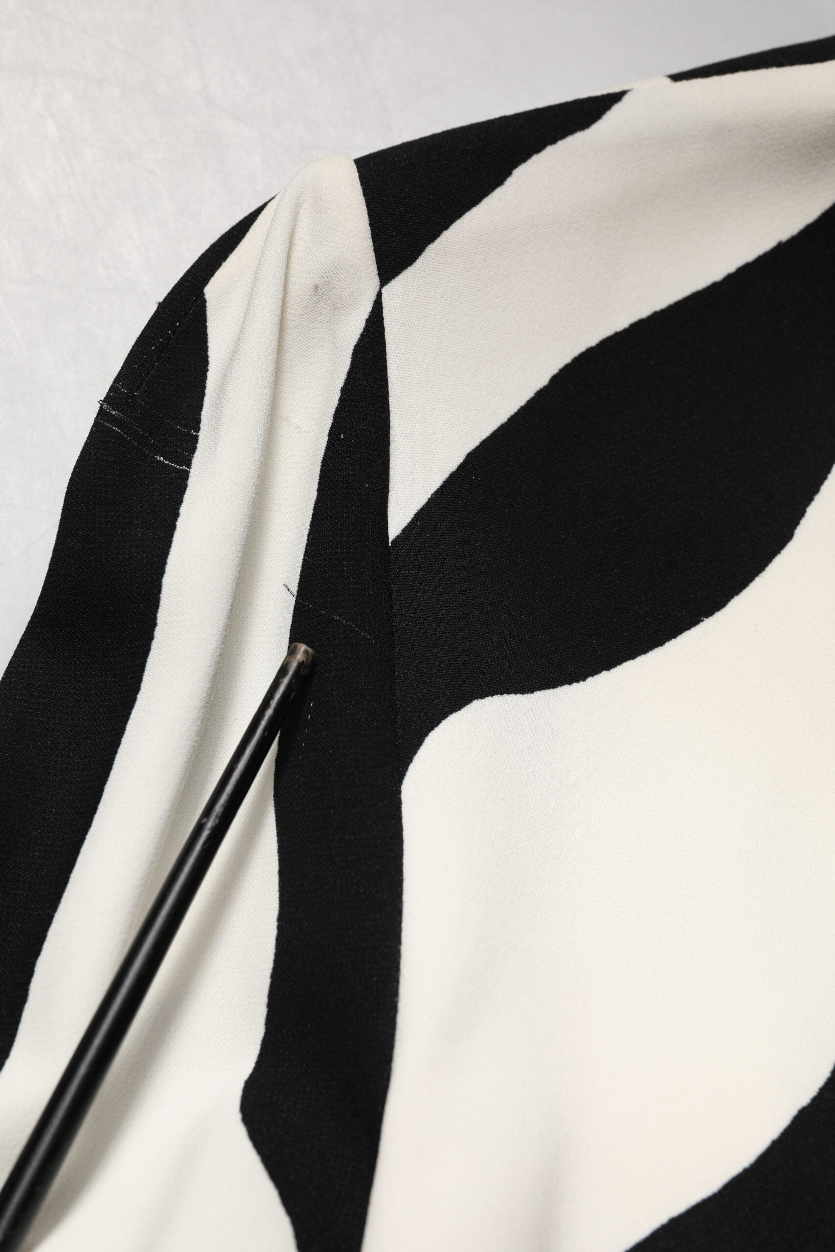 A black and white zebra print midi dress with a viscose fabric