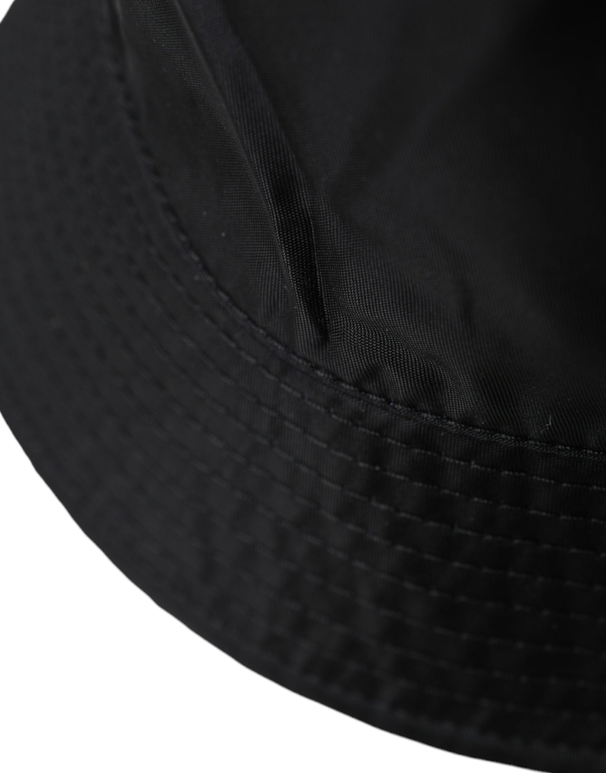 Black cap with a textured pattern on the front panel