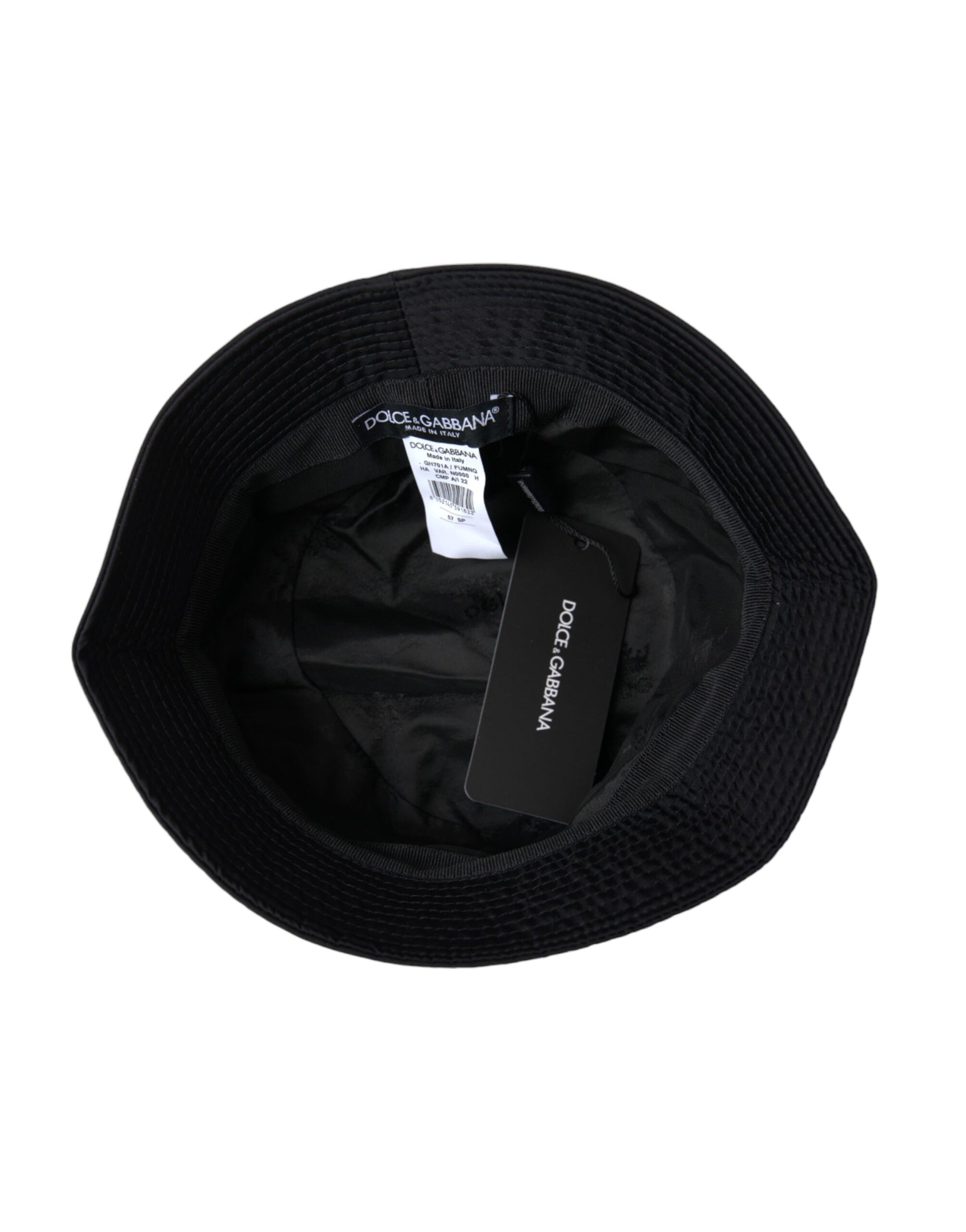 Black circular object with tag on top