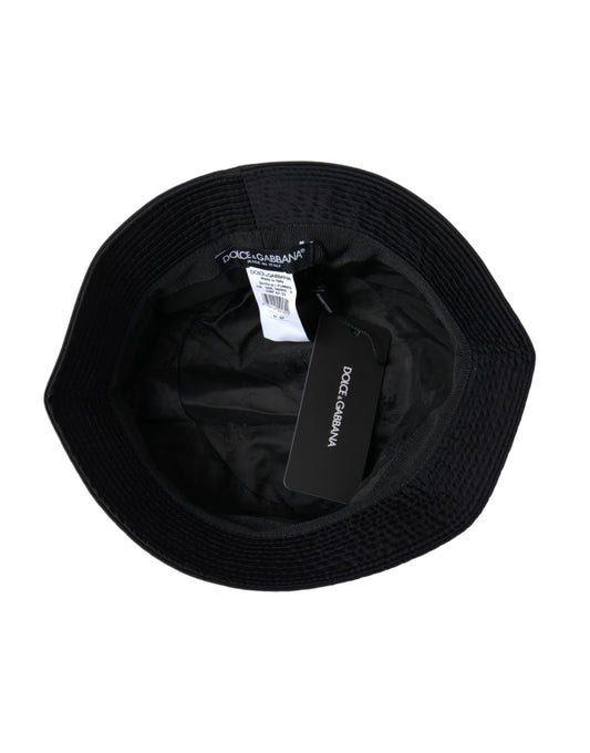 Black circular object with tag on top