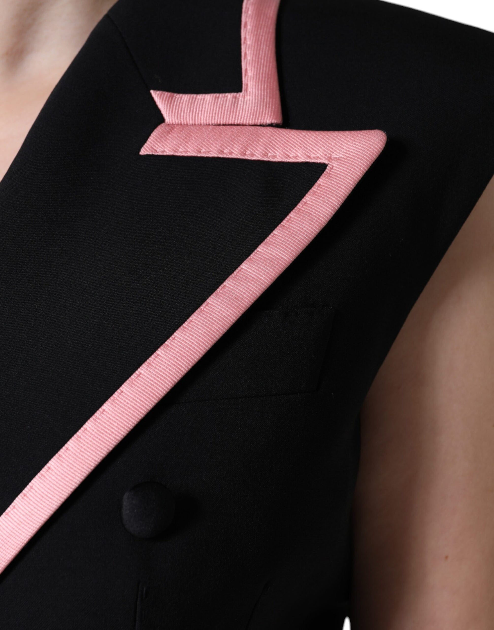 Pink and black sleeveless jumpsuit dress with pink trim