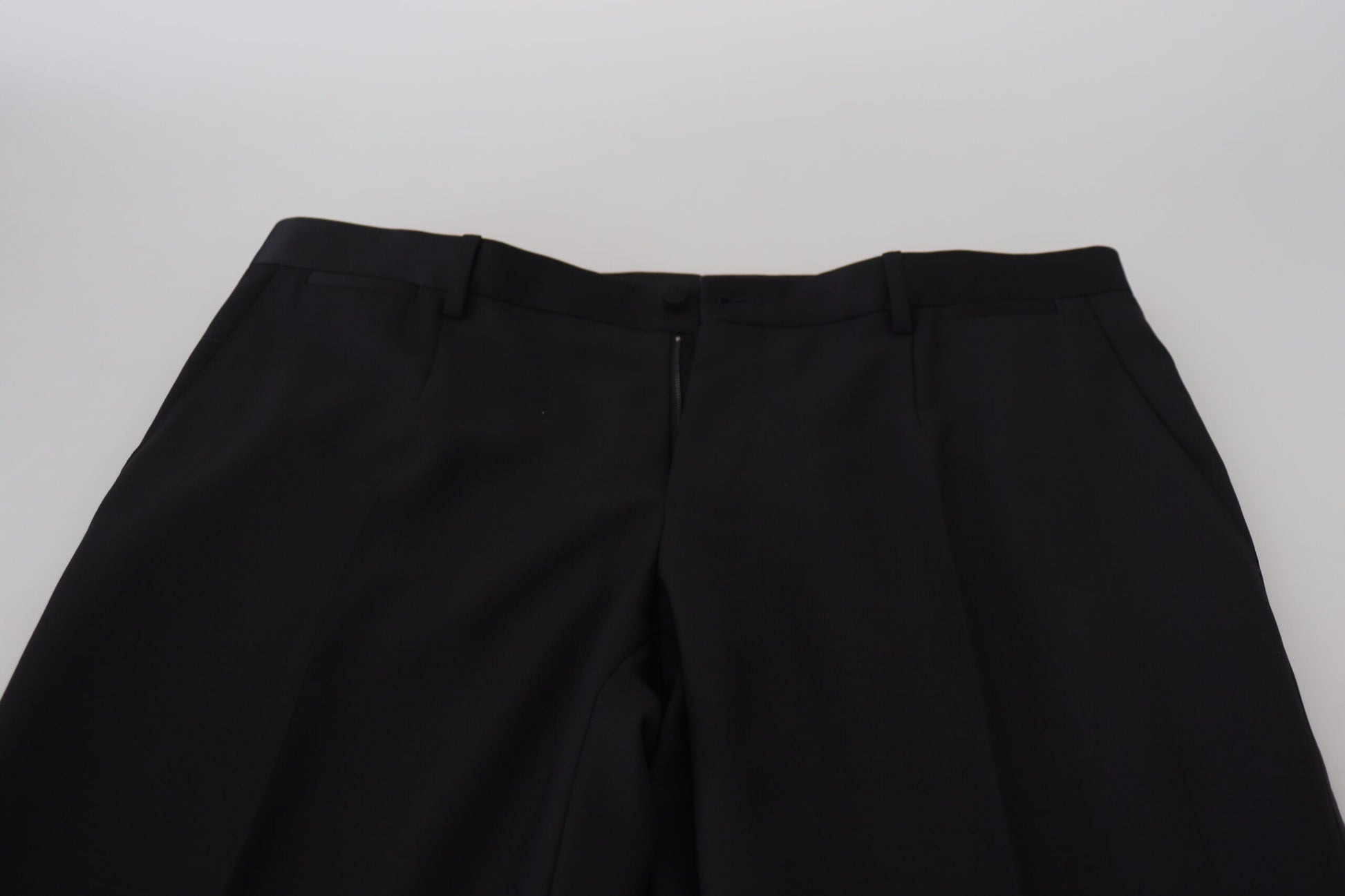 A pair of black wool chino dress pants by Dolce & Gabbana, featuring a formal design