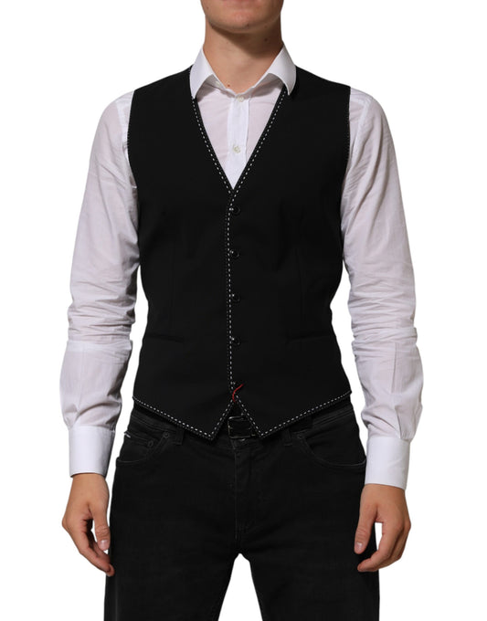 A black wool vest with a waistcoat, part of a formal men's suit