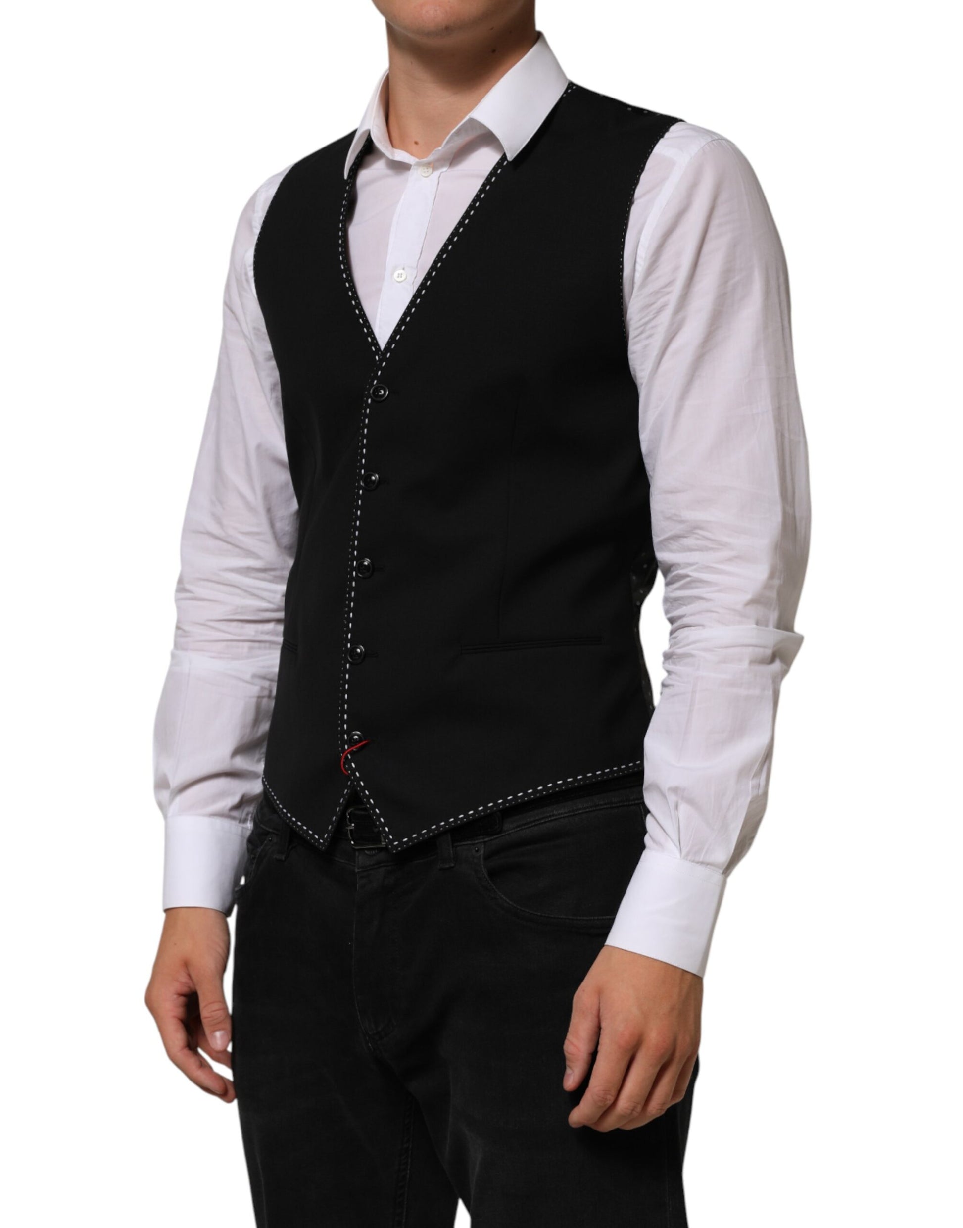 A black wool vest with a lapel and buttons, part of a formal men's suit