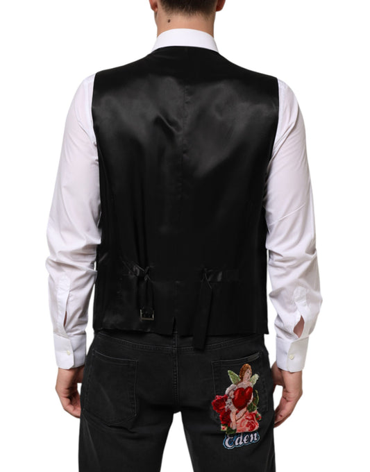 A black wool vest with a lapel and a floral embroidery on the back