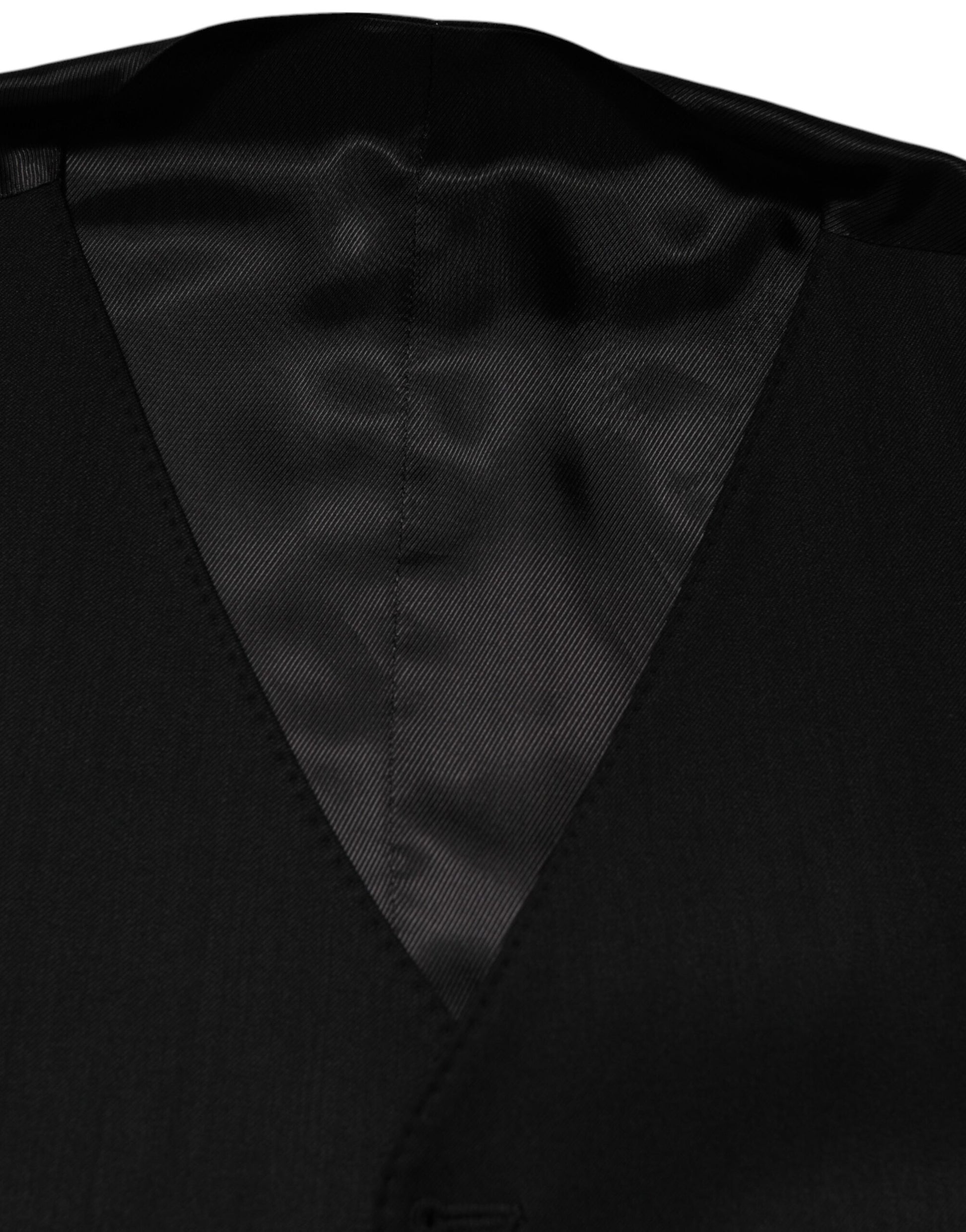 A black wool vest with a lapel and button closure