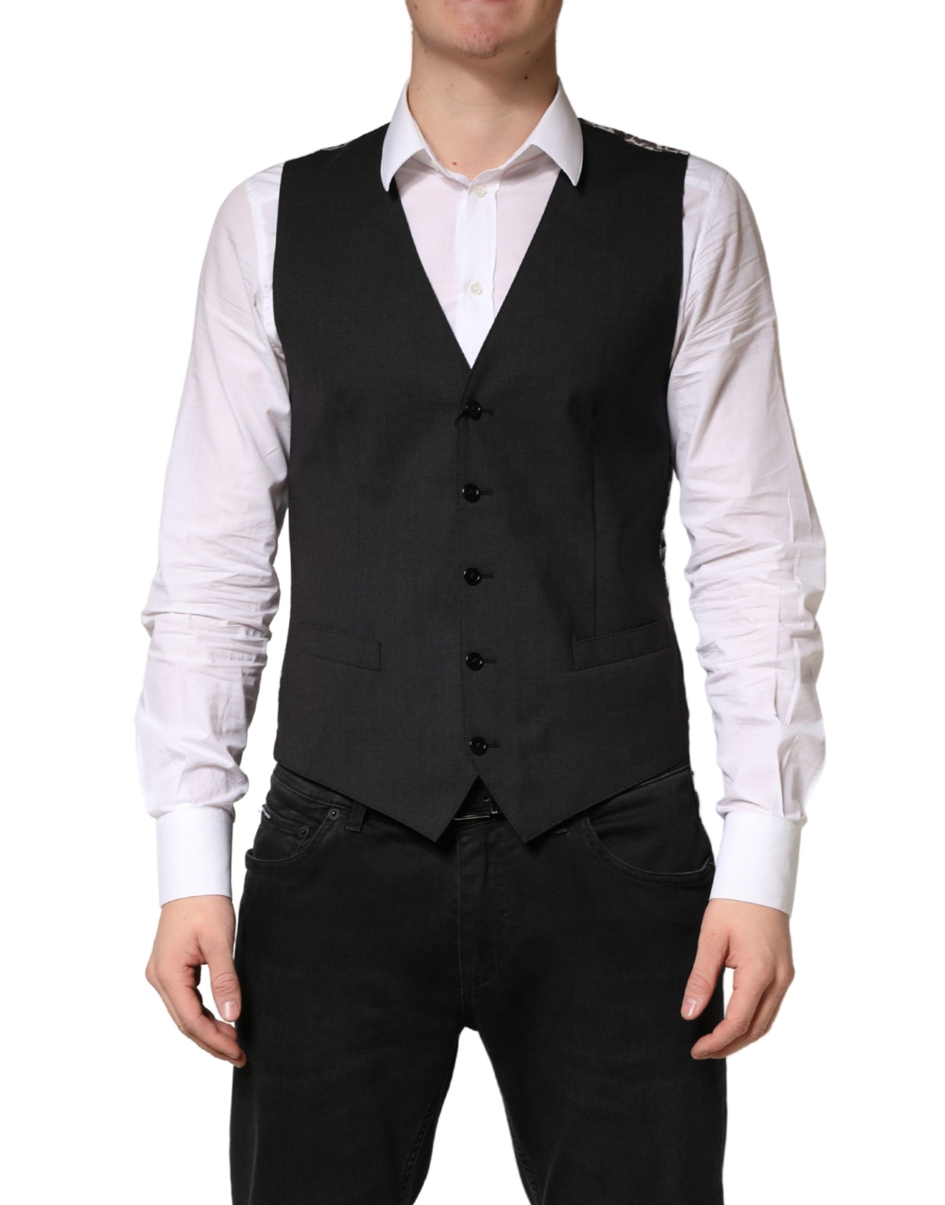 A black wool vest with a waistcoat design, part of a men's formal wear collection by Dolce & Gabbana