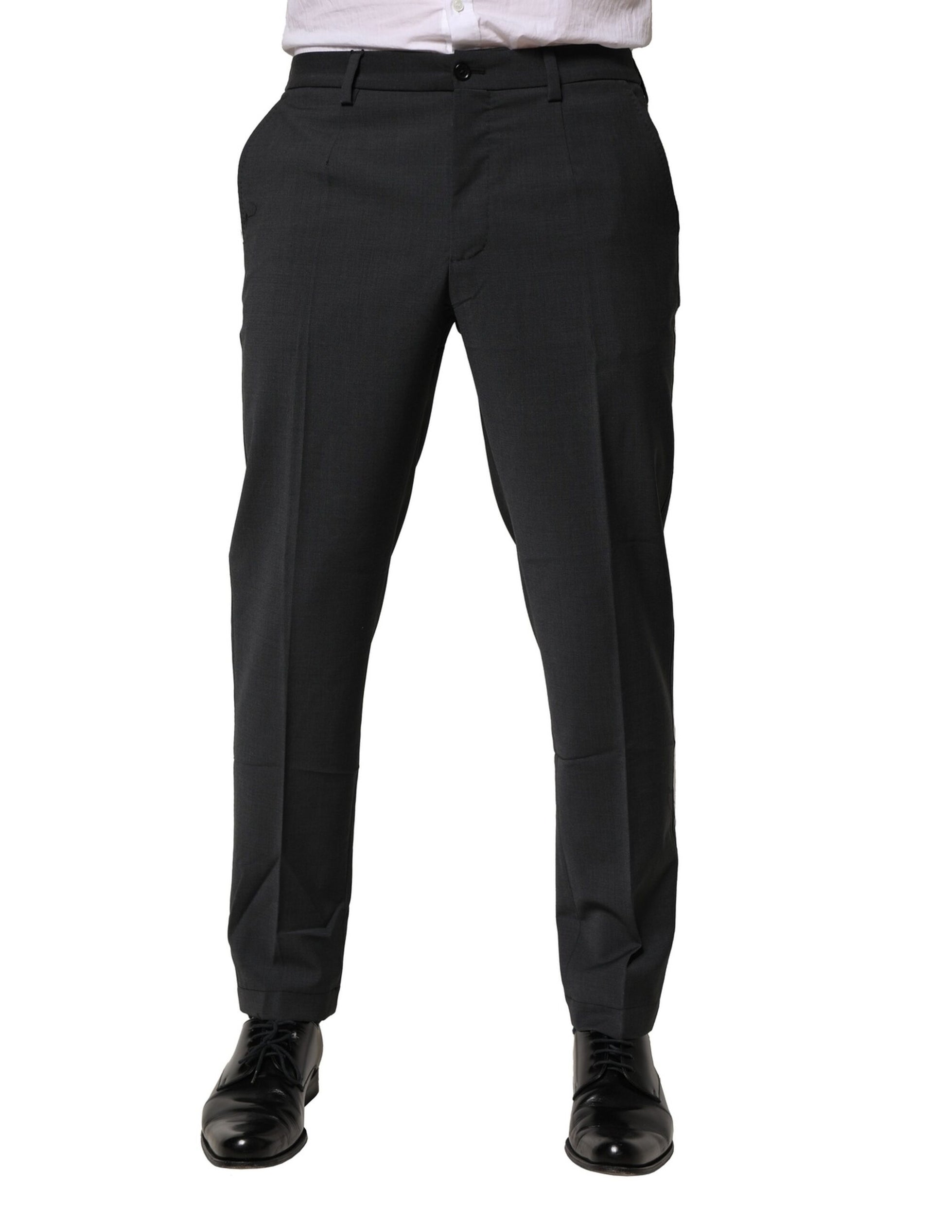 A pair of black wool dress pants from Dolce & Gabbana, featuring a slim fit and formal design