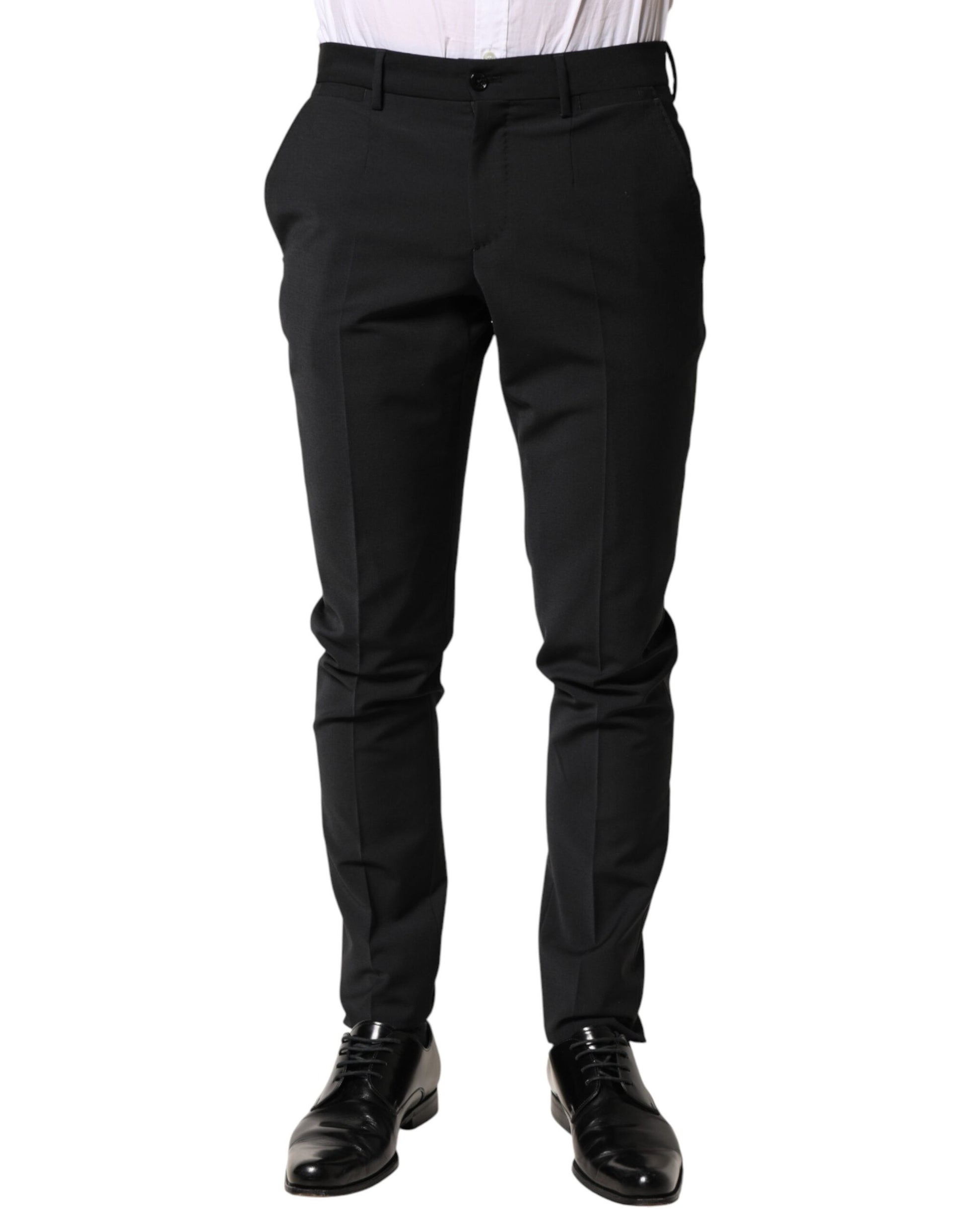 A pair of black wool formal dress trousers from the brand Dolce & Gabbana. They are designed for men and feat