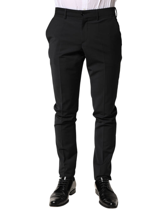 A pair of black wool formal dress trousers from the brand Dolce & Gabbana. They are designed for men and feat