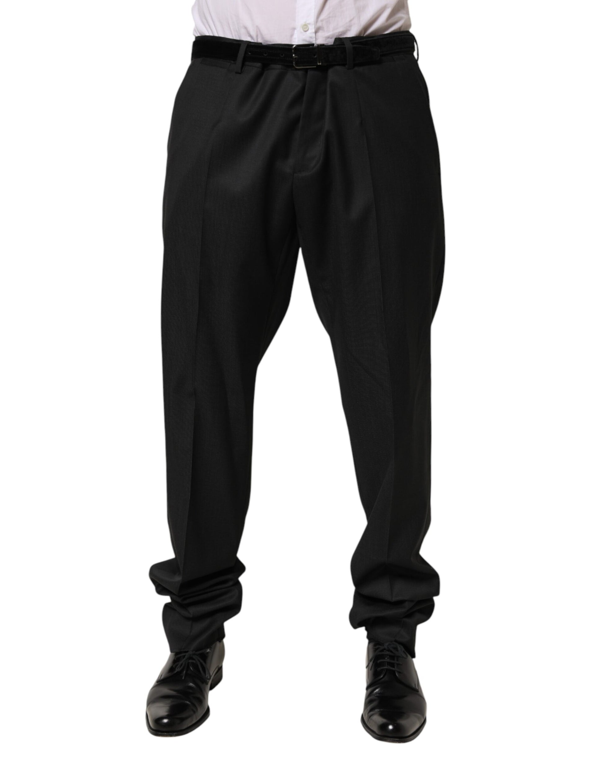 A pair of black wool formal dress trousers with a slim fit and a waistband