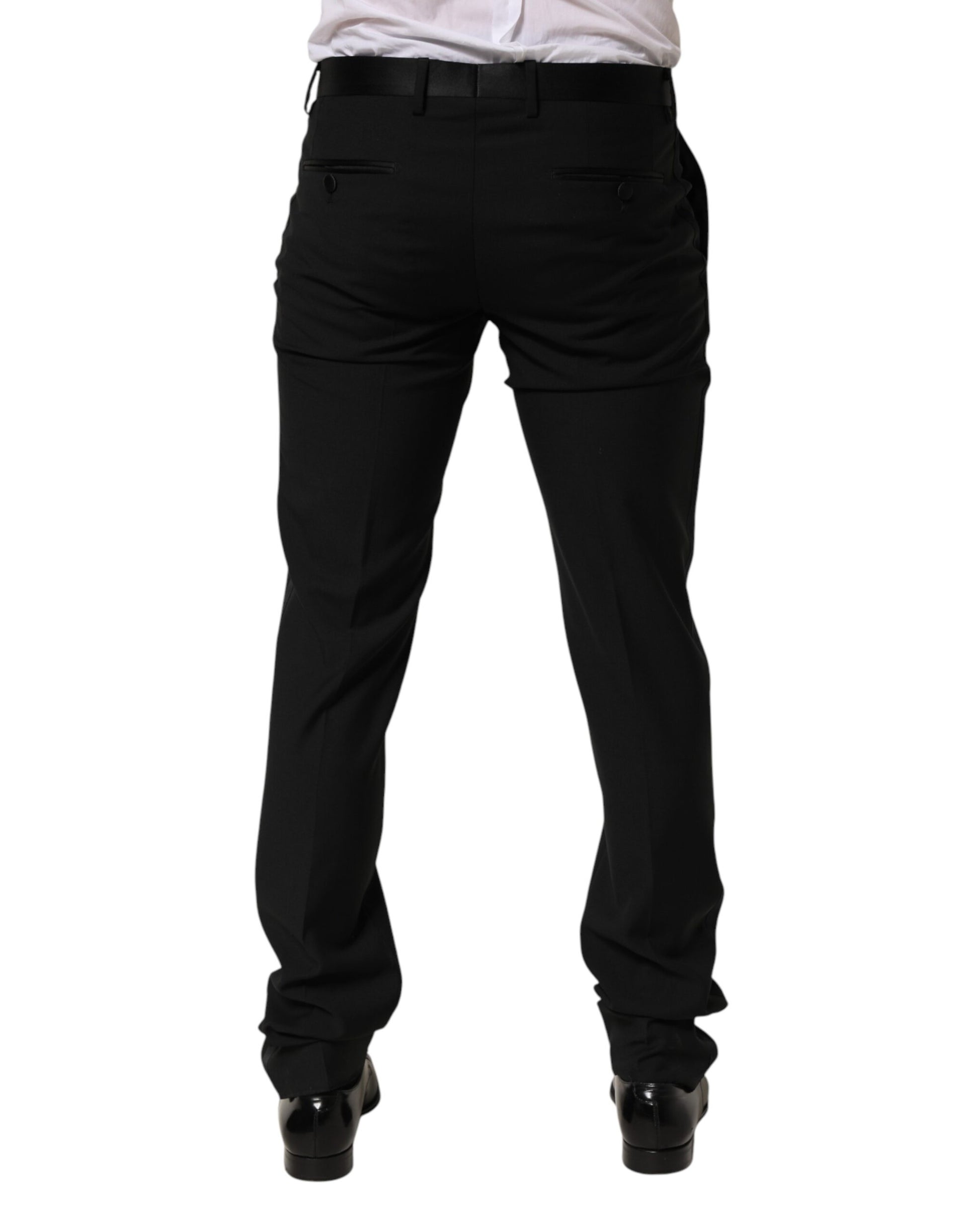A pair of black wool formal dress pants from the brand Dolce & Gabbana. They are designed for men and feature