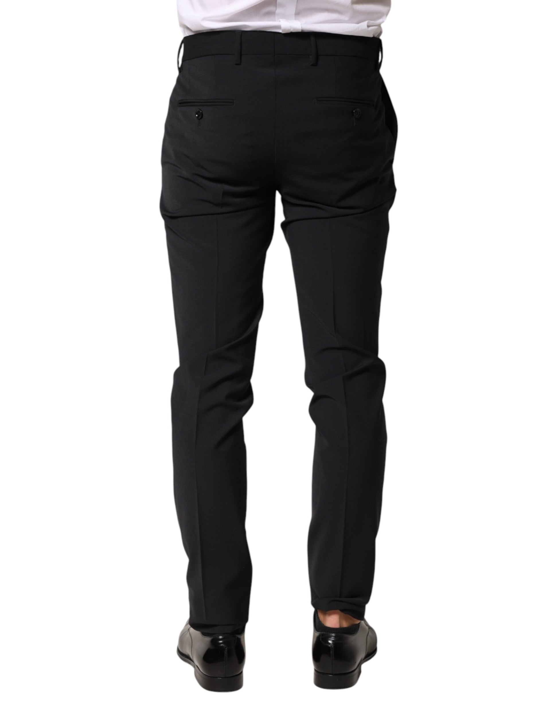 A pair of black wool formal dress pants from the brand Dolce & Gabbana. They are designed for men and feature