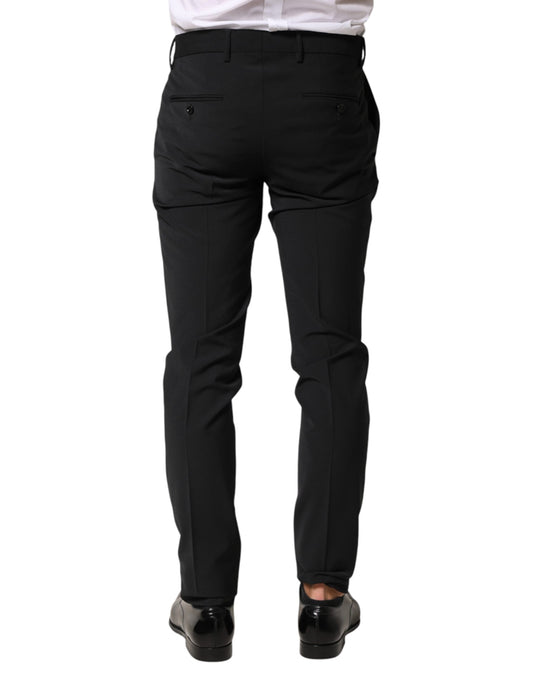 A pair of black wool formal dress pants from the brand Dolce & Gabbana. They are designed for men and feature