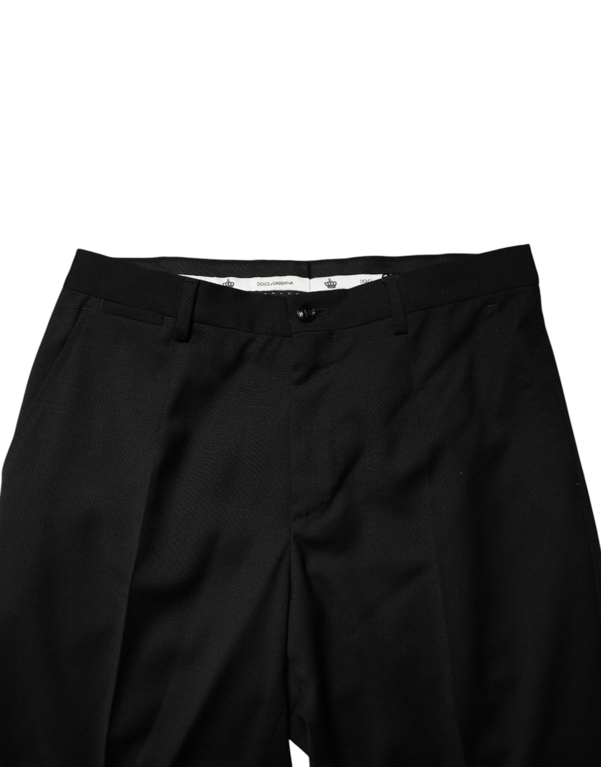 A pair of black wool formal dress men's trousers with a visible waistband and button closure