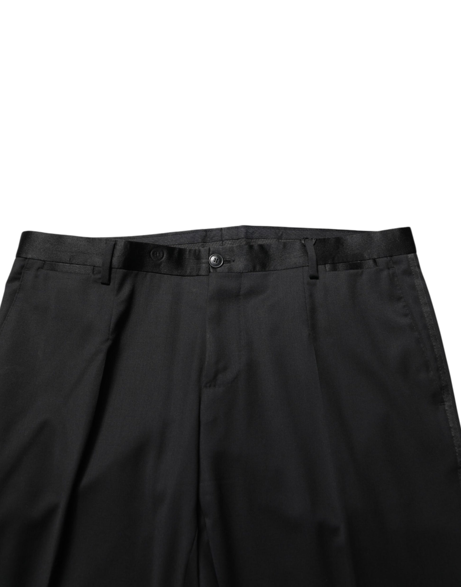A pair of black wool formal dress pants with a slim fit and a buttoned waistband