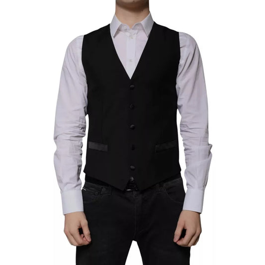 A black wool vest with a waistcoat, part of a formal dress for men