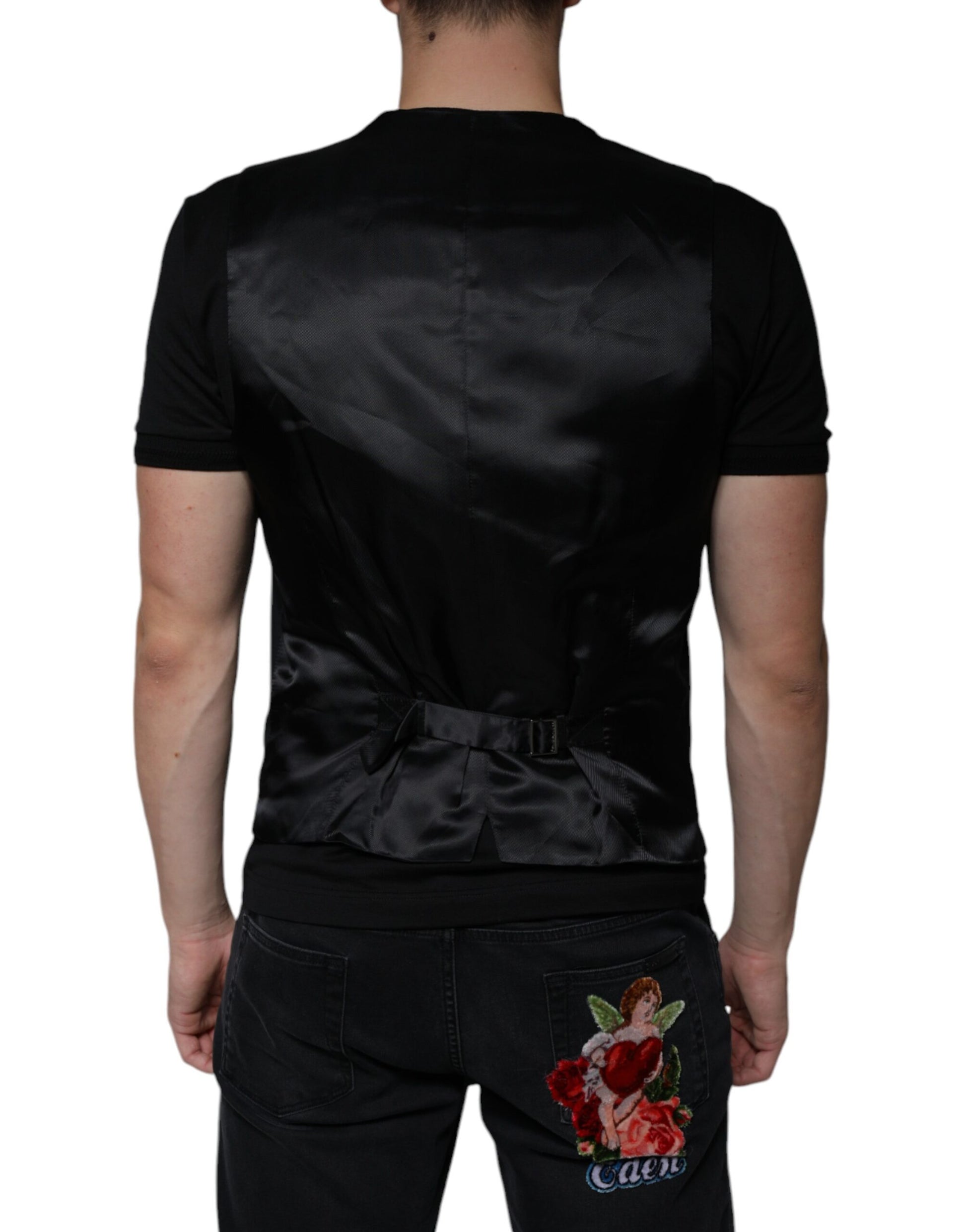 A black wool vest with a lapel collar, worn by a mannequin