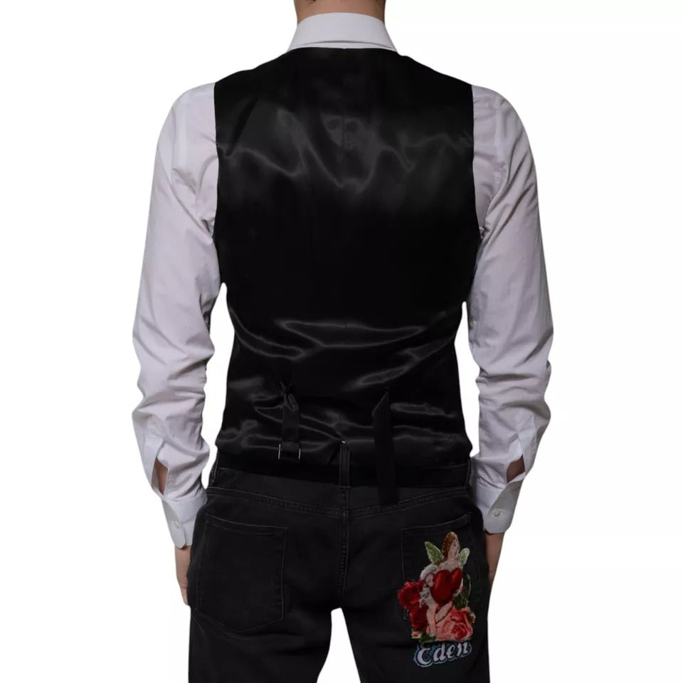 A black wool vest with a rose embroidery on the back